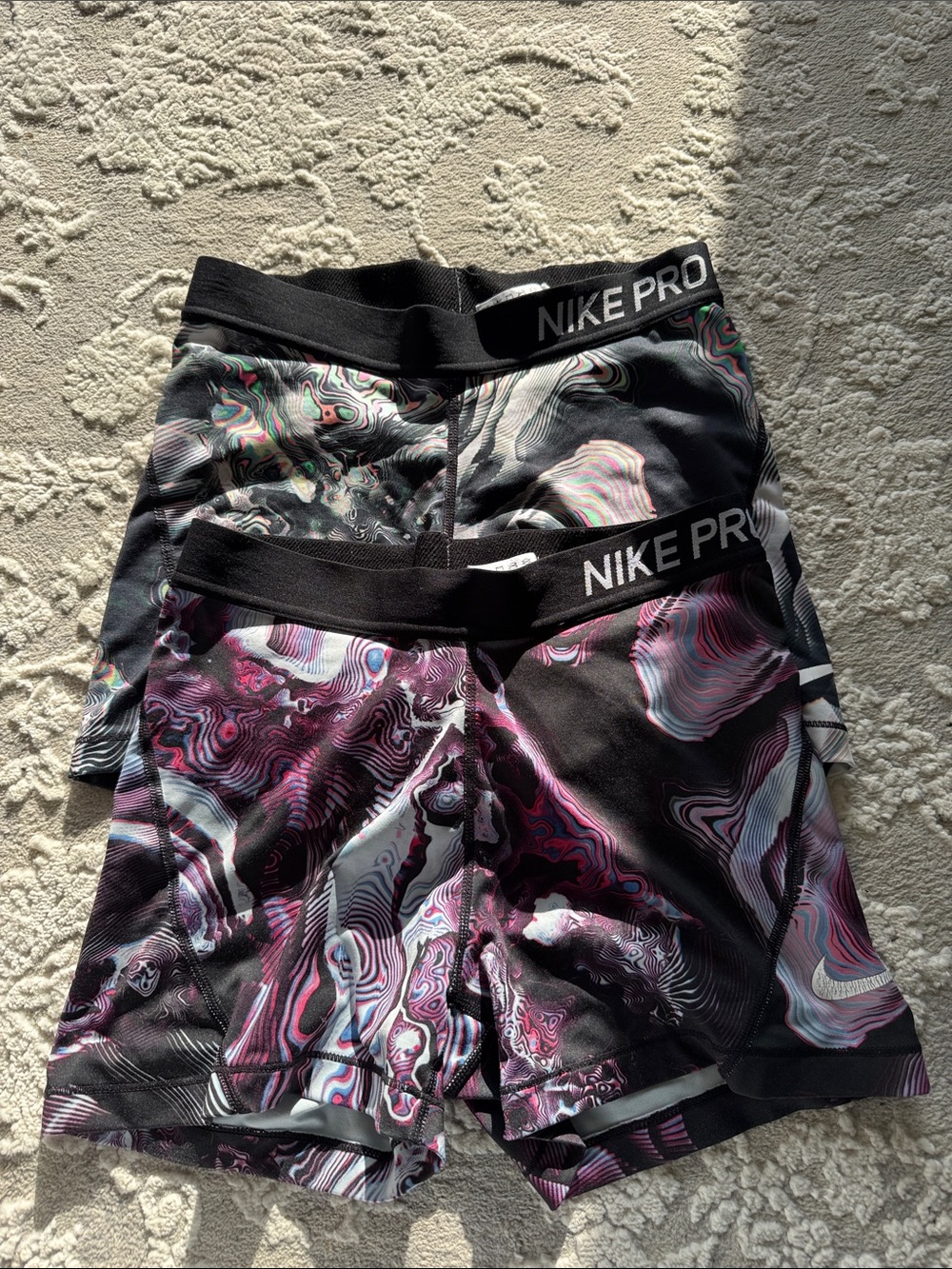 Nike Pro Women's Black and Pink Marble Athletic Shorts (2-Pack)